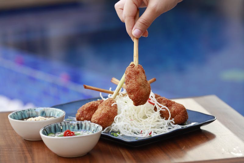 Mozzarella sticks with marinara sauce appetizer