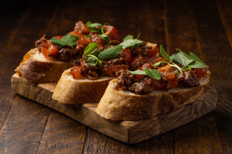 Bruschetta trio with tomato and fresh basil
