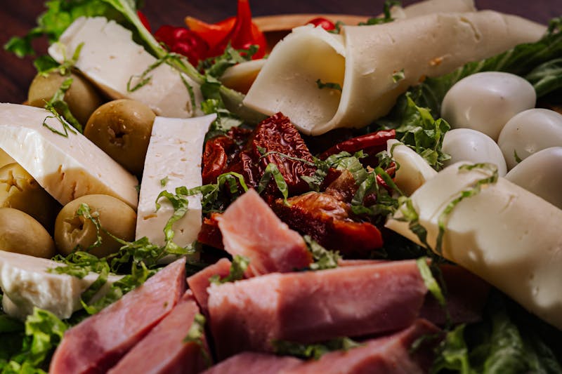 Italian antipasto salad with cured meats and vegetables